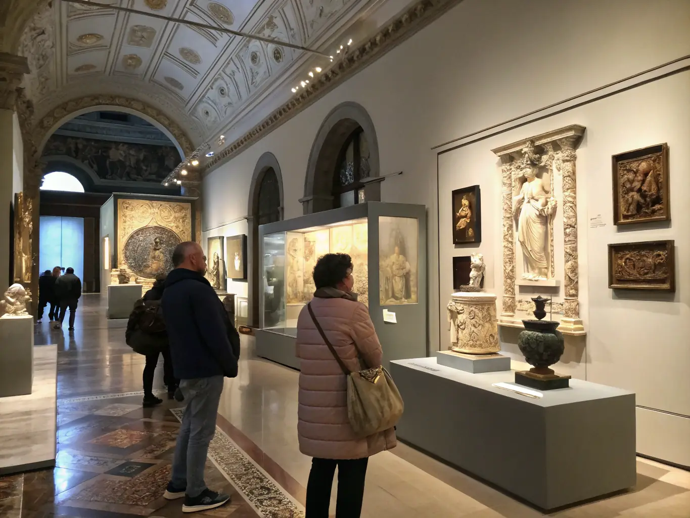 A photograph capturing the opening night of a major exhibition at the Musée d'Art et d'Histoire de Saint-Brieuc, featuring attendees admiring the displayed artworks and historical items, with SOCIETE DES AMIS DU MUSEE D'ART ET D'HISTOIRE DE SAINT-BRIUC members present.